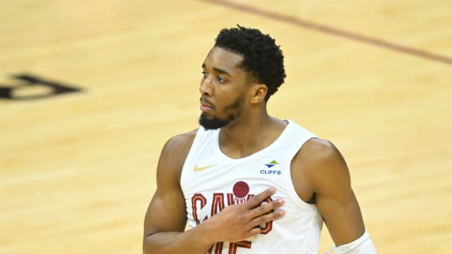 Feb 5, 2024; Cleveland, Ohio, USA; Cleveland Cavaliers guard Donovan Mitchell (45) celebrates his three-point basket in the third quarter against the Sacramento Kings at Rocket Mortgage FieldHouse.
